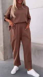 Casual two-piece set for women, solid color crew neck top and cozy pocket trousers for autumn.