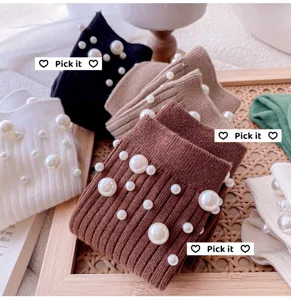 Pearl embellished knit mid-calf socks detail shot, cute stacking socks for women.
