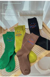 Autumn winter new letter smile embroidery mid tube socks casual college style socks.