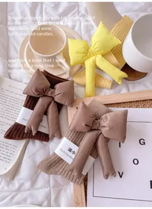 Cozy fleece bow slouch socks for women, winter warm knitted hosiery with 3d bow detail.