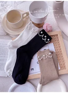 Pearl embellished ribbed mid tube socks for women, stylish cozy knit daily casual footwear style.