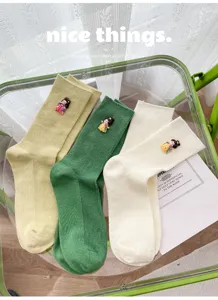 Cute Tang style striped mid-tube socks for women, sweet casual cotton knit hosiery items.