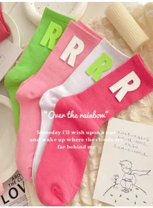 Sweet ins style women mid-tube socks featuring cute R letter patch design, comfortable knit fabric.