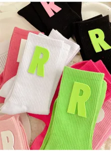 Women's cute ribbed crew socks with letter R patch, colorful casual daily cotton socks.