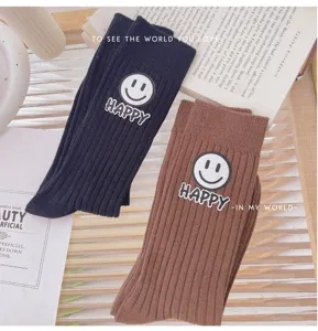 Korean style smiley face ribbed mid-calf socks for women autumn winter casual fashion wear.