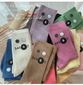 Colorful stacking socks featuring cute smiley faces and numbers for women autumn winter style