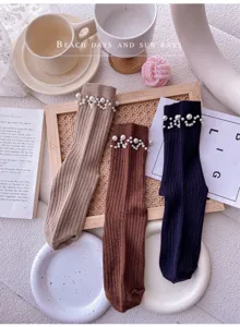 Pearl knitted mid-calf socks detailed view, elegant cuff design, cozy daily wear style.