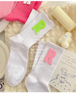White mid-calf socks with neon green and pink letter R patches, sweet ins style comfy cotton socks.