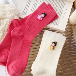 Cute Japanese style crew socks with Tang dynasty doll decoration and knit fabric.
