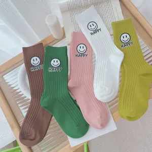 Cute knit mid-tube socks for women with letter print and cozy autumn winter daily wear style.