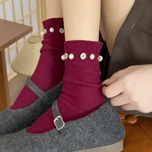 Women's fashion mid-tube socks featuring elegant pearls and sparkling blue rhinestone flower charms.