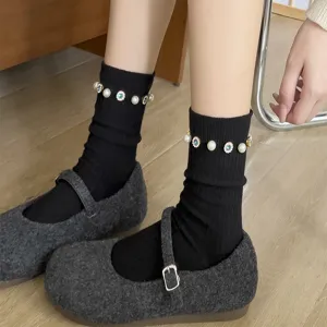 Women fashion black mid-tube socks with elegant pearls and sparkling rhinestones for autumn winter.