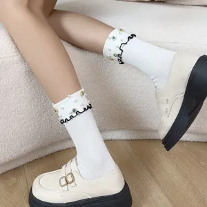 Korean style white mid tube socks featuring pearls blue rhinestones and sweet lettuce frill cuffs.