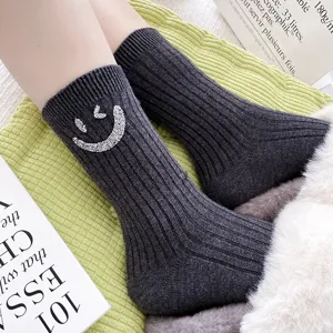Stylish rhinestone smiley ribbed mid-calf socks for women, perfect for autumn and winter.