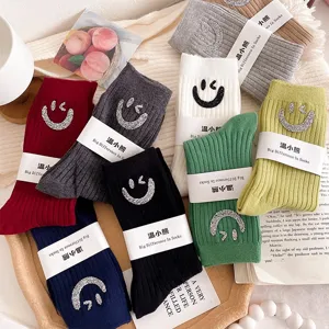 Trendy Korean style rhinestone winking smiley face mid-tube socks, versatile autumn winter socks.