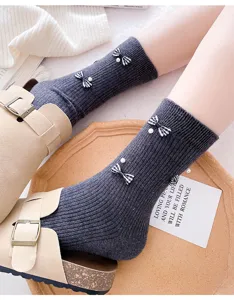 Dark grey ribbed mid-calf socks featuring plaid bow and pearl decor for stylish daily wear.