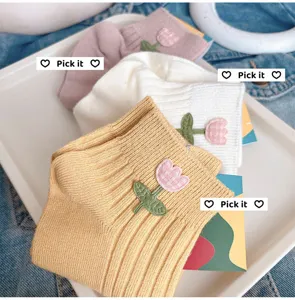 Detailed view of cute Japanese sweet tulip embroidered short socks, soft cotton knit, summer wear.