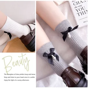Cute women mid-tube cotton socks with black bow and pearl pendant for autumn winter outfits
