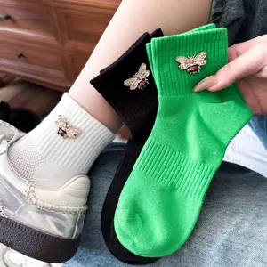 Cotton rhinestone bee short socks feature breathable mesh, stylish Korean preppy style daily wear.