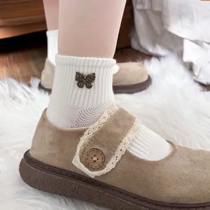 Women white cotton mesh short socks with sweet butterfly decoration for summer daily wear.