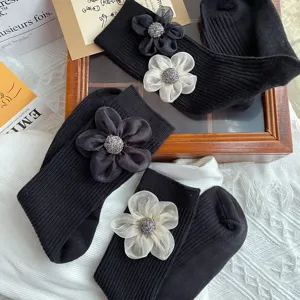 Women black ribbed mid-calf socks with 3D fabric flower and rhinestone center winter cute hosiery