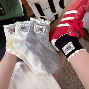 Japanese cute ruffle lace socks with retro buttons, breathable cotton short socks for women.
