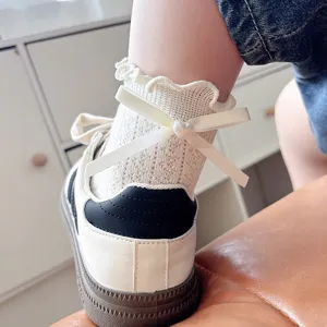 Women summer breathable mesh short socks with sweet heart bow and lace ruffle trim JK style.