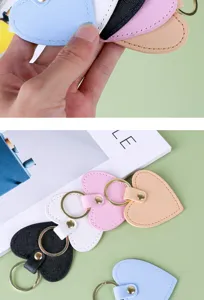 Llavero de cuero en forma de corazón lindo anillo de metal bolso colgante regalo.