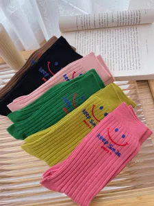 Colorful ribbed crew socks with cute letter smiley print, casual fashion daily wear socks for women.