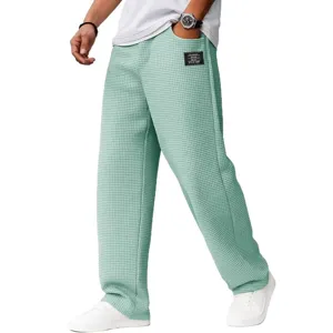 Pantalon décontracté pour homme en tricot gaufré coupe droite vert clair, style urbain.