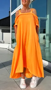 Robe longue de plage orange vif, design décontracté sans manches pour femme chic.