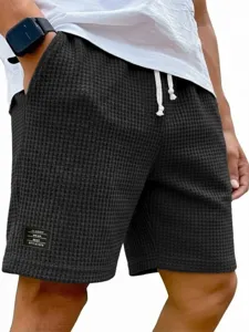 Shorts décontractés en tricot gaufré pour homme avec cordon été mode streetwear tendance
