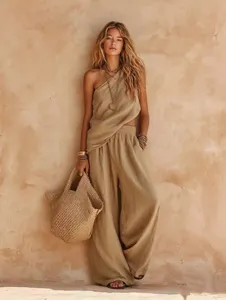 Casual beige linen one-shoulder sleeveless top and wide-leg trousers set detail view.