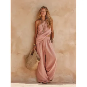 Pink one-shoulder top and wide-leg trousers set for women, casual summer outfit main view.