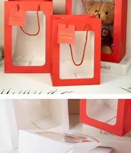 Vista detallada de bolsas de regalo de papel rojas y blancas minimalistas con ventana.