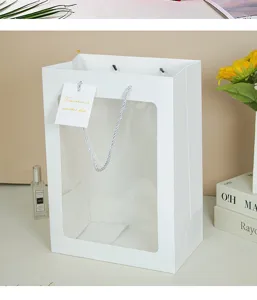 Bolsa de regalo de papel blanco con ventana transparente, elegante bolsa para tiendas.