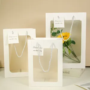 Bolsa de regalo de papel con ventana transparente, elegante bolso para compras.