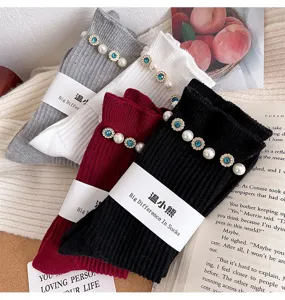 Ribbed mid-calf socks featuring sparkling rhinestones and elegant faux pearl floral lace trim.