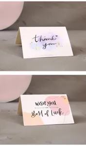Carte de vœux pliante dorée avec texte de remerciement, idéale pour cadeaux et fleuristes.
