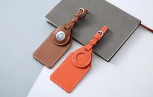 PU leather luggage tag protective case designed for Apple AirTag tracker, stylish travel accessory.