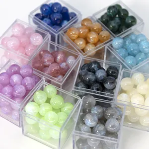 Fine glitter resin round beads detail, perfect for DIY handmade charm bracelets and necklaces.