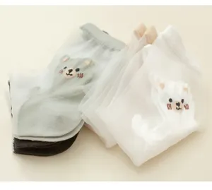 Detail of sheer crystal silk cartoon bear socks, thin summer mesh design with cotton sole.