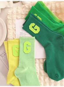 Women green mid tube socks trendy college style with letter G patch casual daily wear