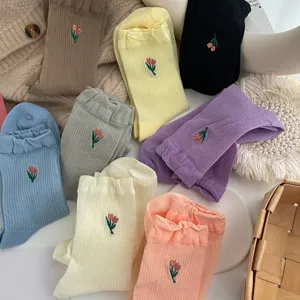 Cute women mid-tube socks with sweet tulip embroidery, casual cotton knit hosiery for daily wear.