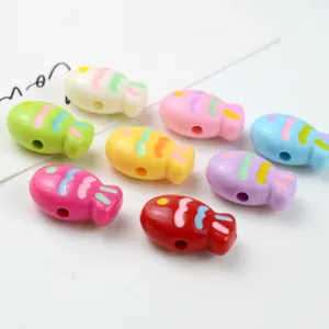 Acrylic fish beads detail shot, colorful cute charms for DIY bracelets, phone chains and handmade jewelry.