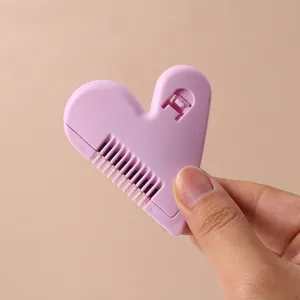 Peine de corte de pelo de doble cara con forma de corazón para un estilo seguro en casa.