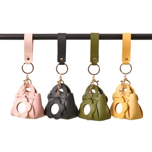 Cute mini PU leather handbag keychain with mirror and metal chain, set of four colors.