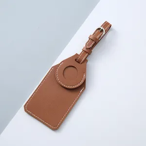 Brown PU leather luggage tag protective case specifically designed for Apple AirTag tracker.