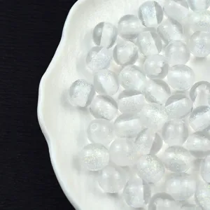 16mm clear resin sparkle beads close-up, shiny starry cat eye design for DIY handmade jewelry.