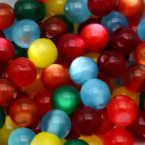 Colorful resin cat eye beads closeup, ideal for DIY handmade bracelets and vintage accessories.